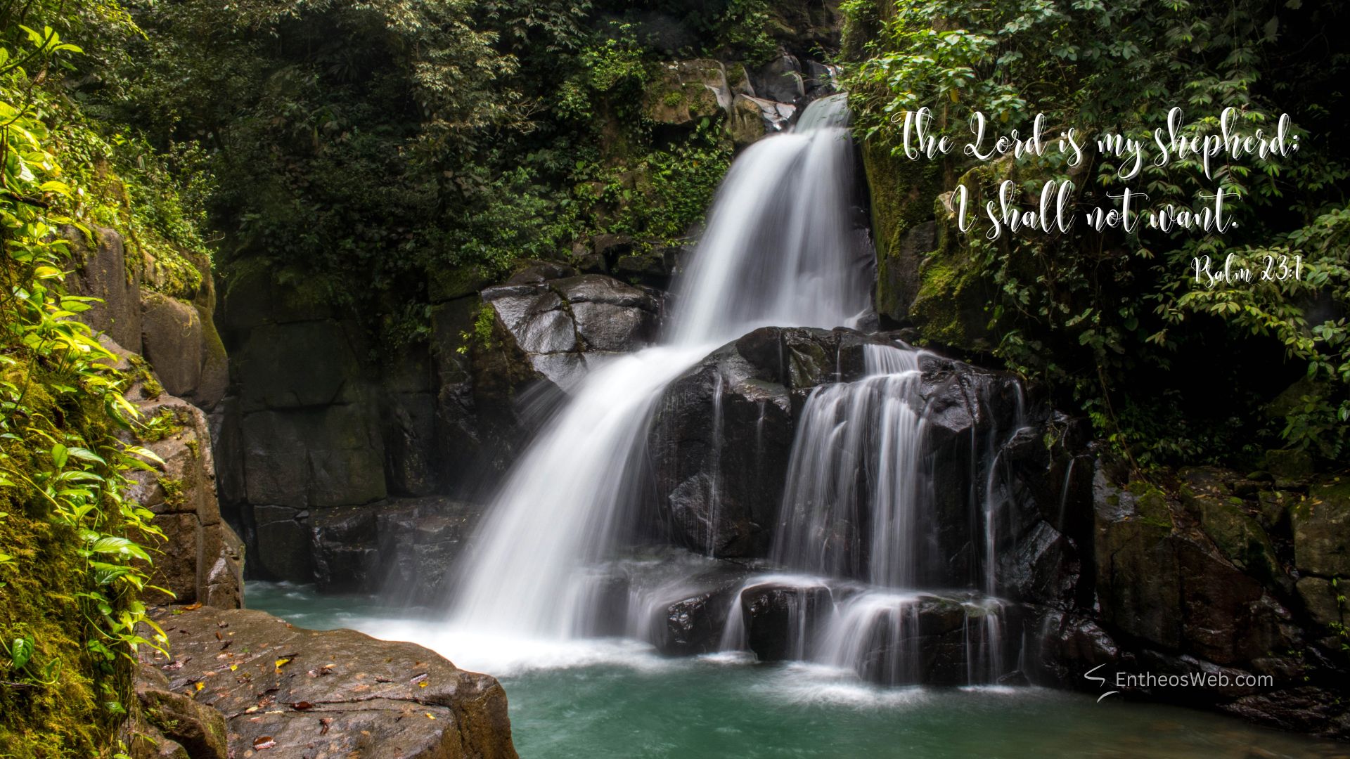 Waterfall christian desktop wallpaper designed by entheosweb | christian desktop wallpaper with encouraging bible verses | entheosweb Waterfall cascading over rocks in a lush forest with the psalm 231 verse written in white script on the right side waterfall christian desktop wallpaper designed by entheosweb