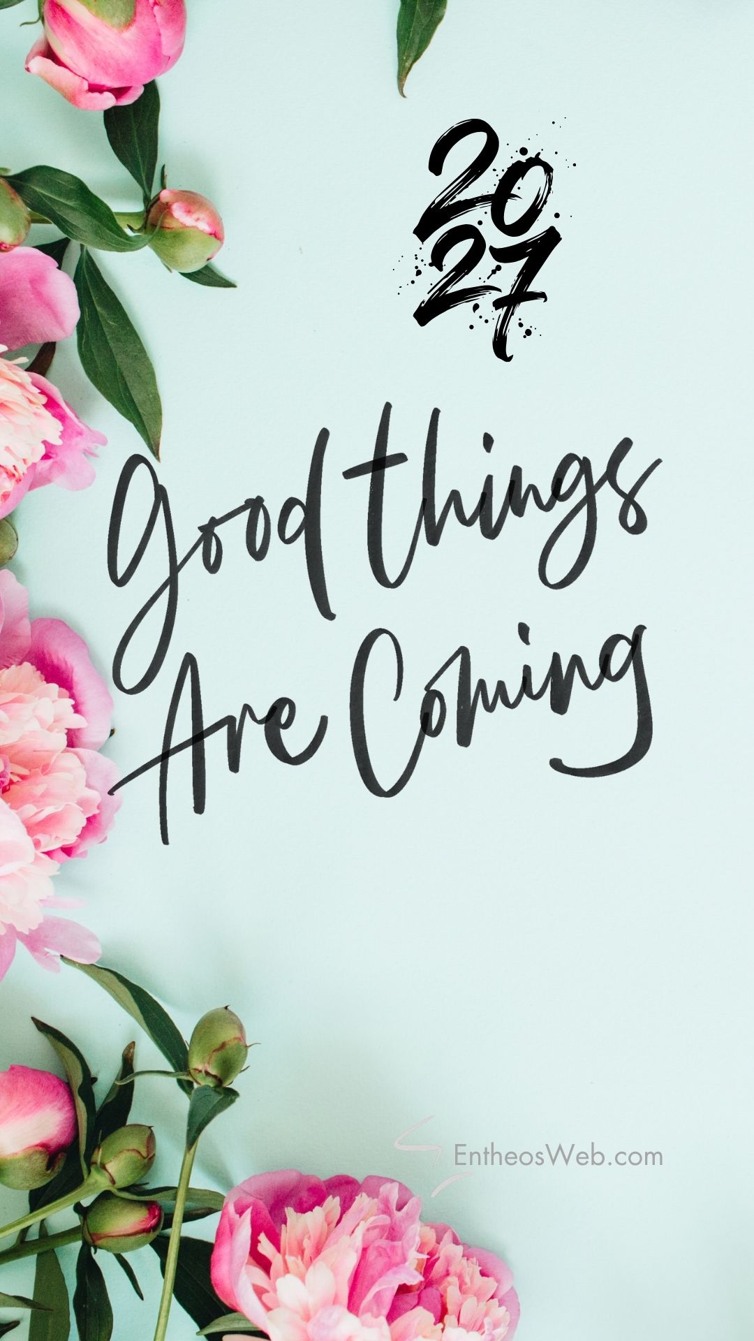 2027 good things are coming | 2027 motivational phone wallpaper | entheosweb Light blue background with pink peonies along the left edge and the handwritten message good things are coming 2027 good things are coming